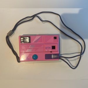COPY - PINK LE CLIC VINTAGE 80’s camera. (Similar to one used in movie my cousi…